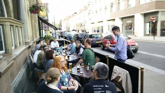 Pic of people drinking outside a pub