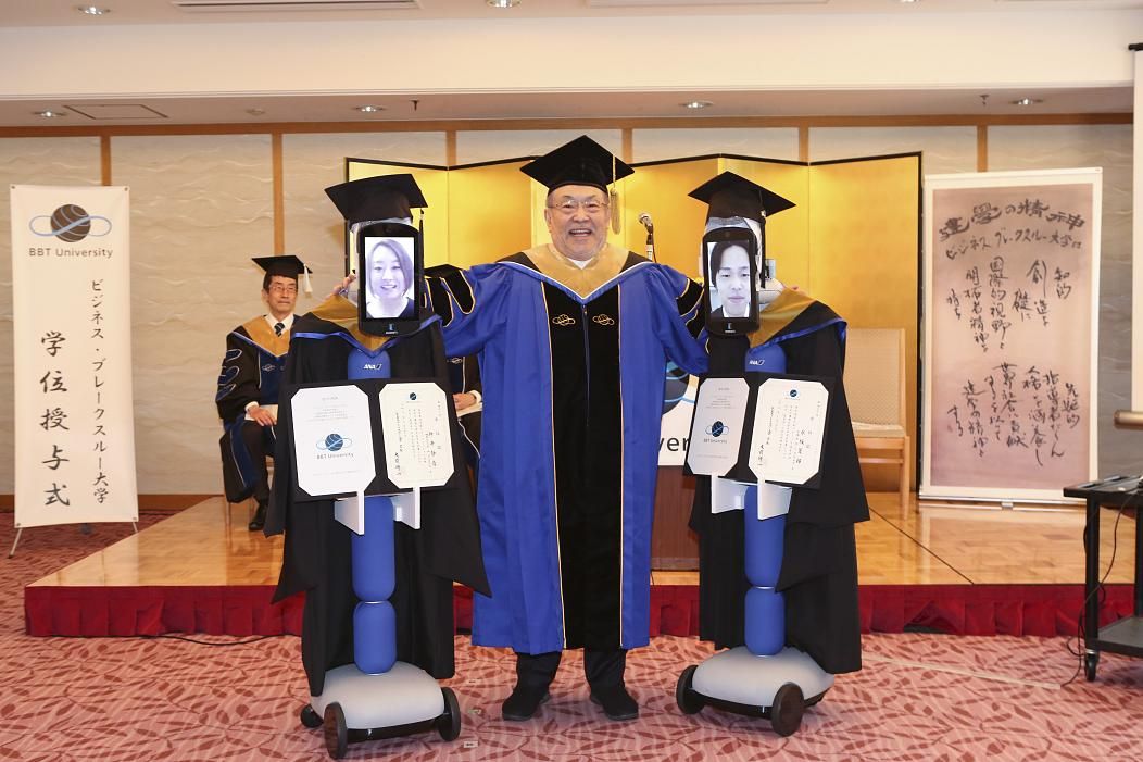 Robots attending graduation in japan